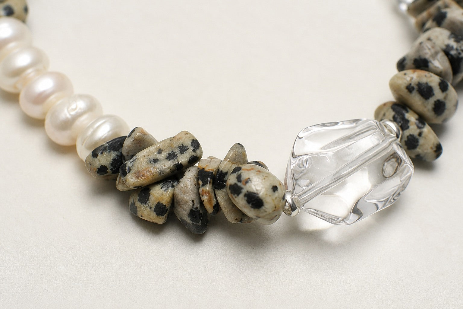 Close-up of clear quartz bracelet stones and sterling silver details for visual inspection