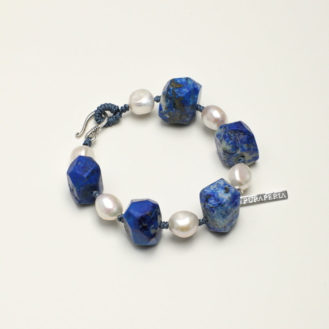 Sterling silver gemstone and freshwater pearl bracelet detail