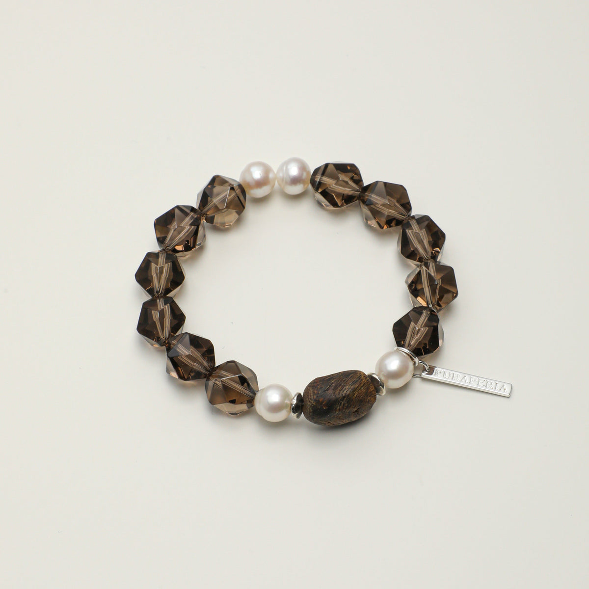 Faceted agarwood and freshwater pearl bracelet by Mineralyra