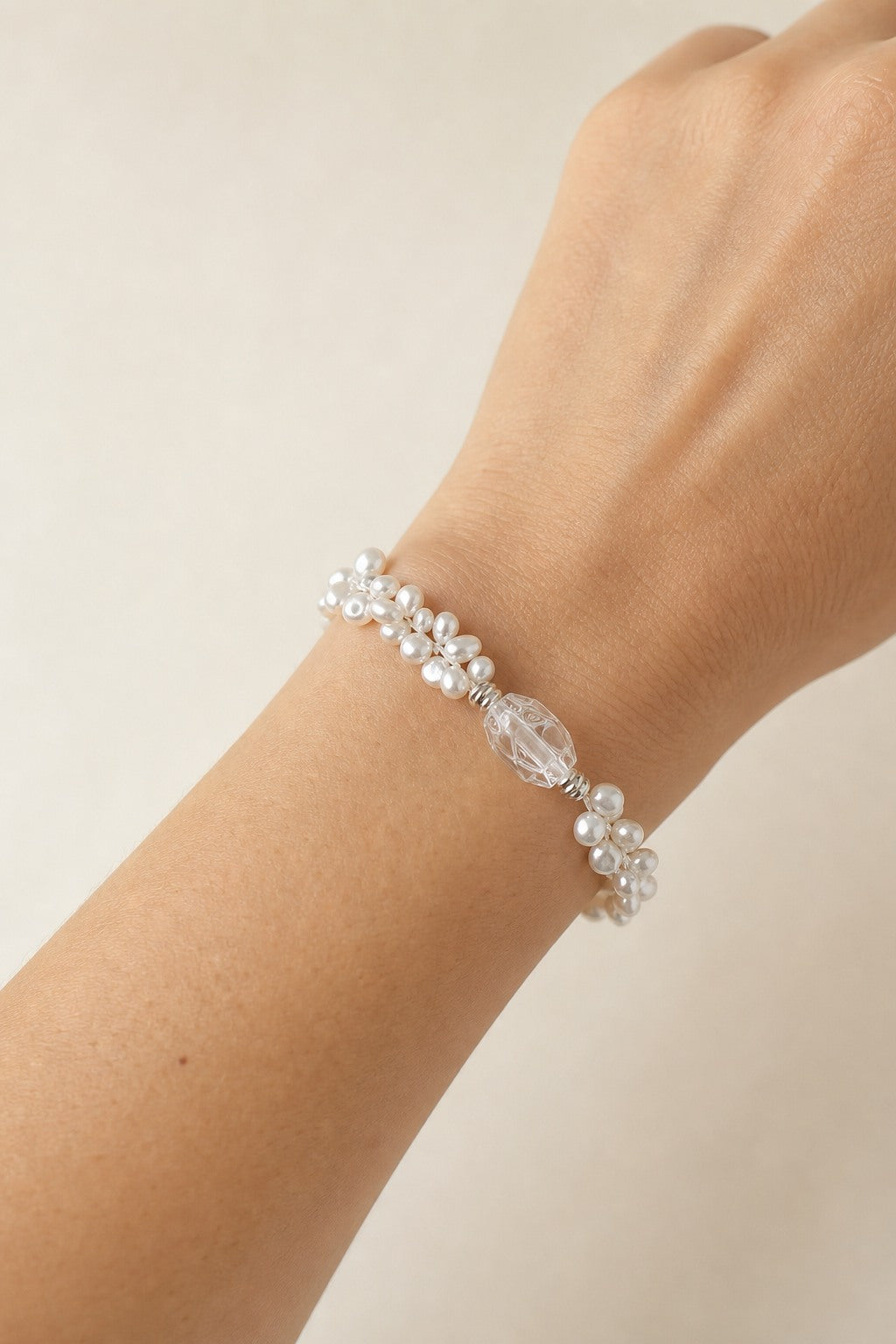 Clear Quartz & Baroque Pearl Bracelet – Double-Point, Sterling Silver — model wearing view showing bracelet scale and fit