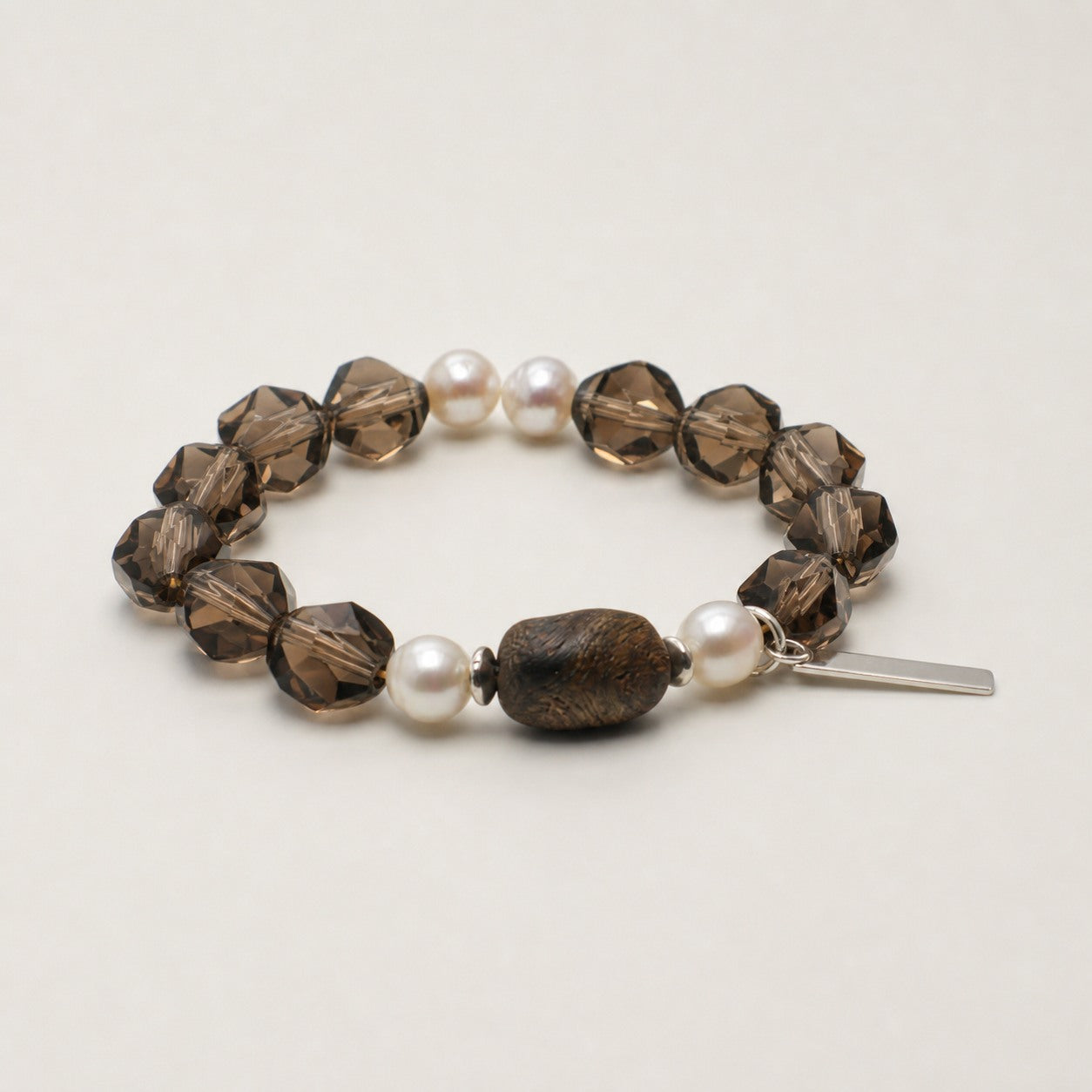 Agarwood & Freshwater Pearl Bracelet – Faceted, Sterling Silver — alternate angle showing bracelet structure and tag