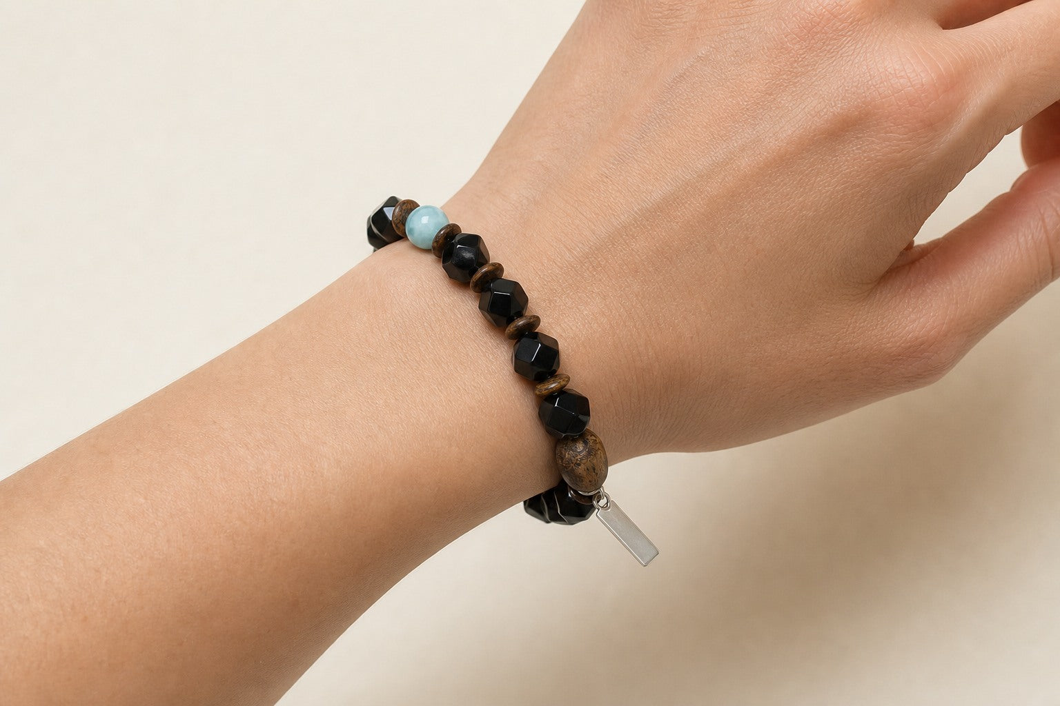 Agate & Agarwood Bracelet – Faceted, Sterling Silver — model wearing view showing bracelet scale and fit