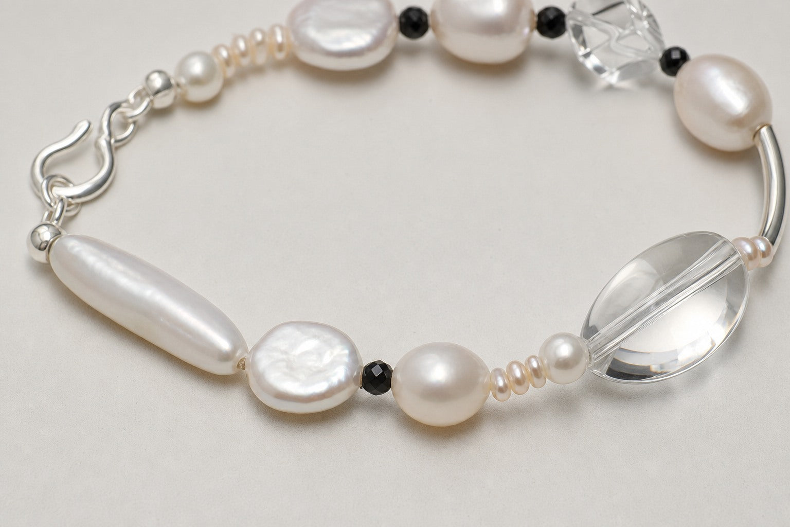 Clear Quartz & Black Tourmaline Bracelet – Drop, Sterling Silver — close-up showing stone, pearl and sterling silver details