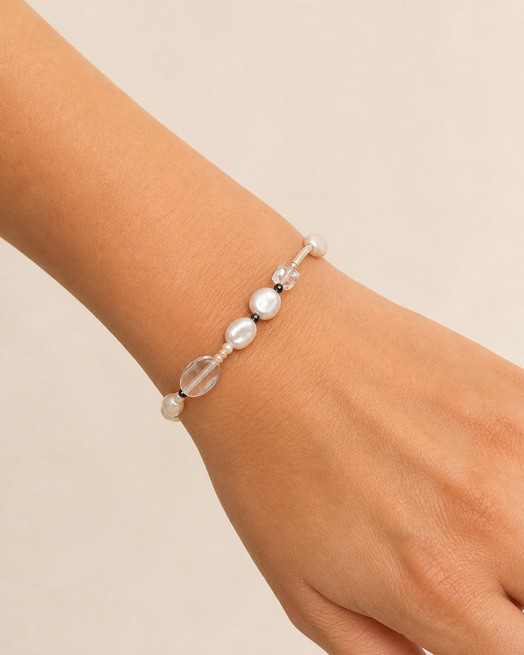 Clear Quartz & Black Tourmaline Bracelet – Drop, Sterling Silver — model wearing view showing bracelet scale and fit