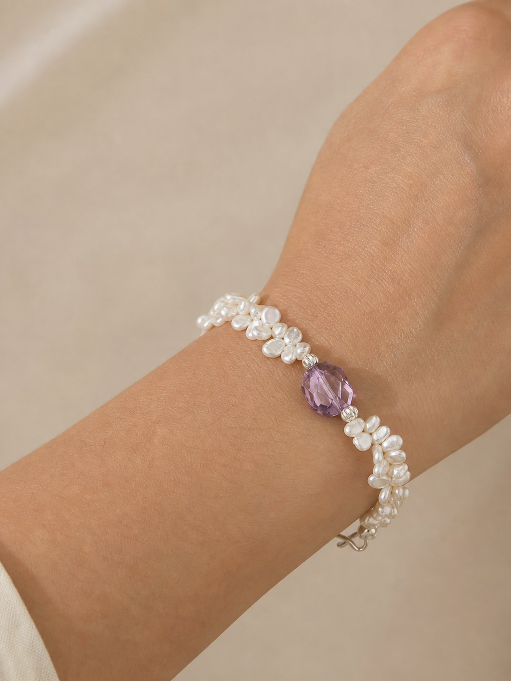 Amethyst & Baroque Pearl Bracelet worn on model at realistic scale
