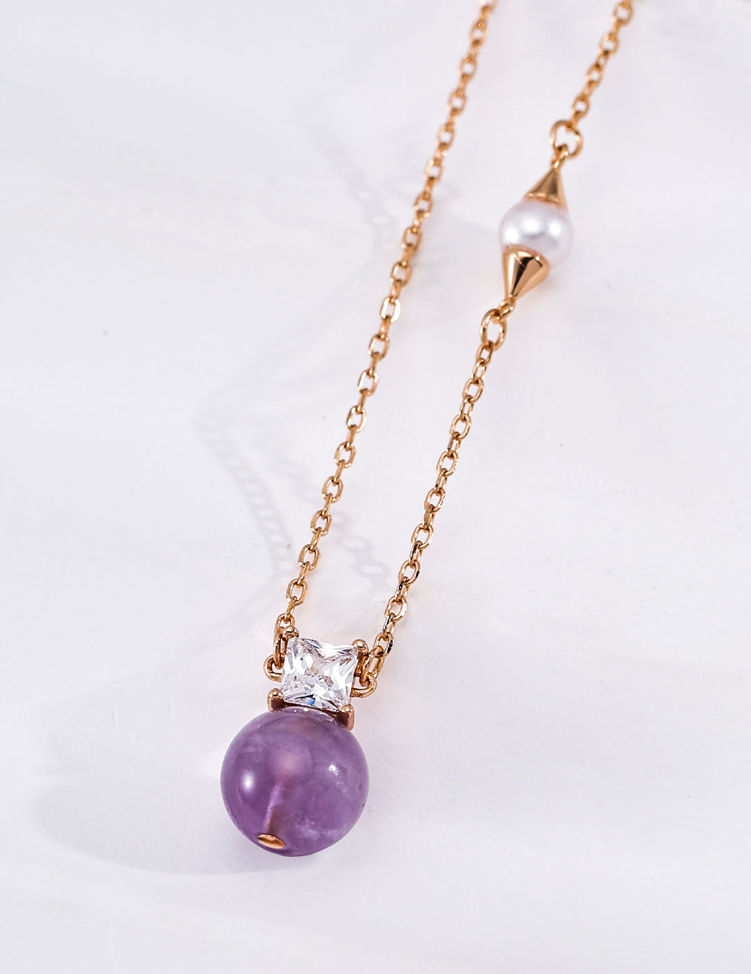 Amethyst or Baroque Pearl Pendant Necklace — detail or styling view; other jewelry sold separately