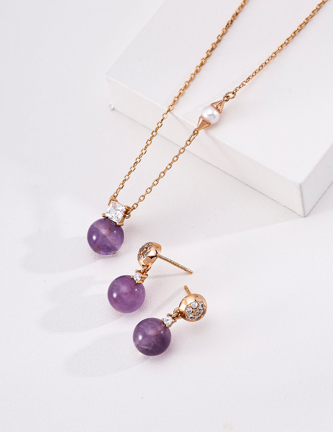 Amethyst or Baroque Pearl Pendant Necklace — detail or styling view; other jewelry sold separately