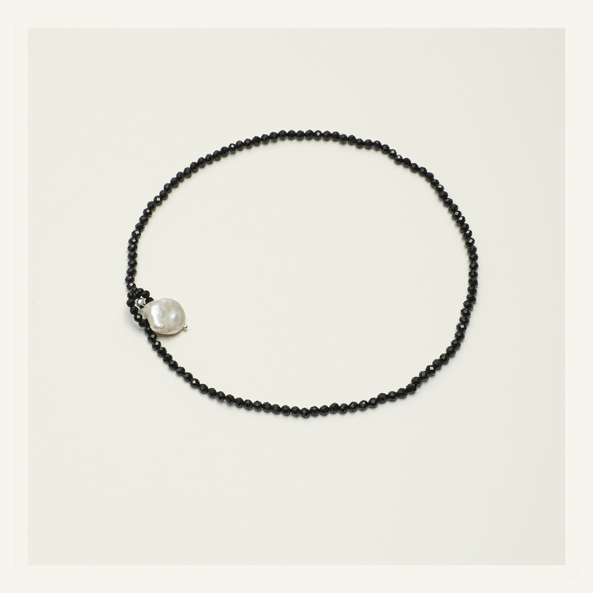 Black Tourmaline Moon Pearl Necklace product view on a clean neutral background