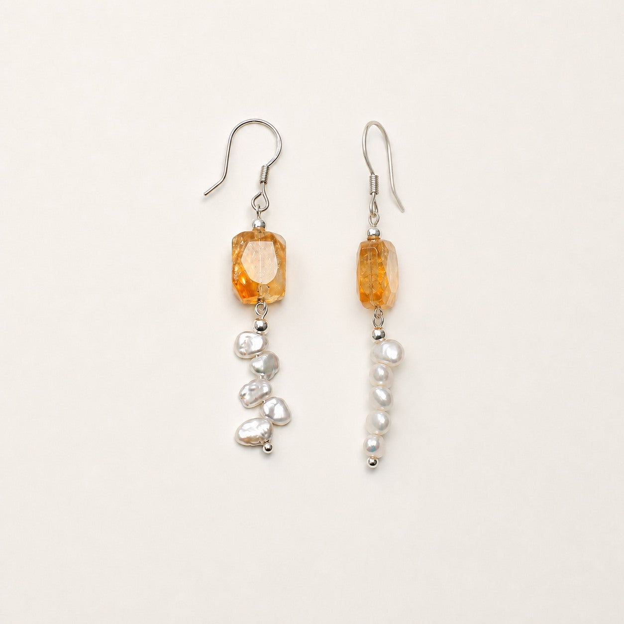 Citrine and baroque pearl earring pair shown from front and side angles