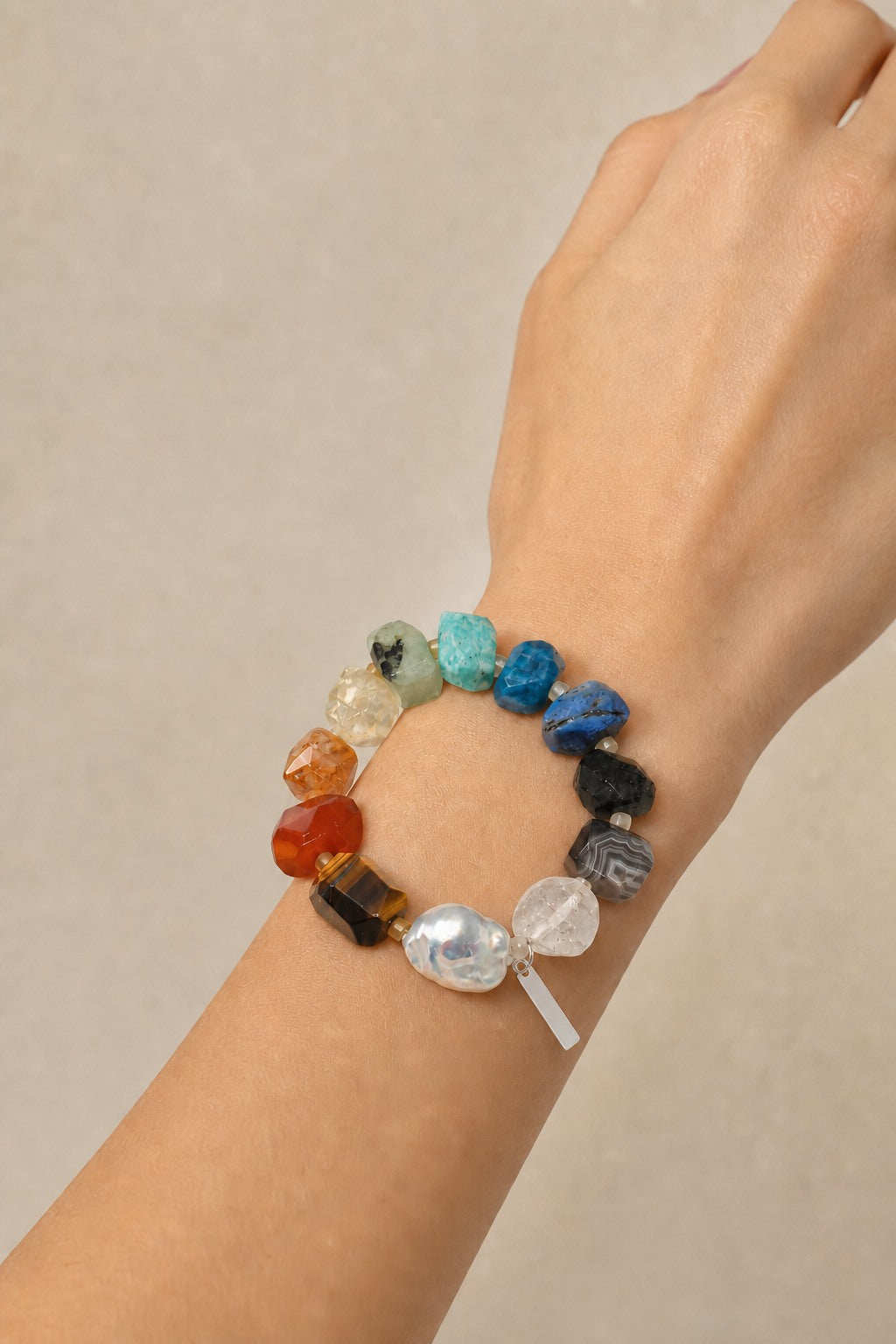 Citrine, clear quartz and mixed natural-stone bracelet worn securely around the wrist