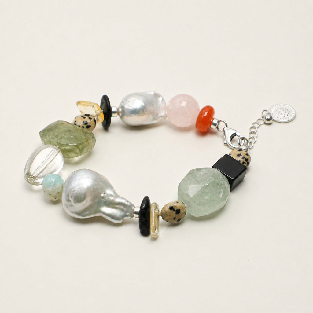 Citrine and clear quartz freeform bracelet shown from an alternate angle with clasp visible