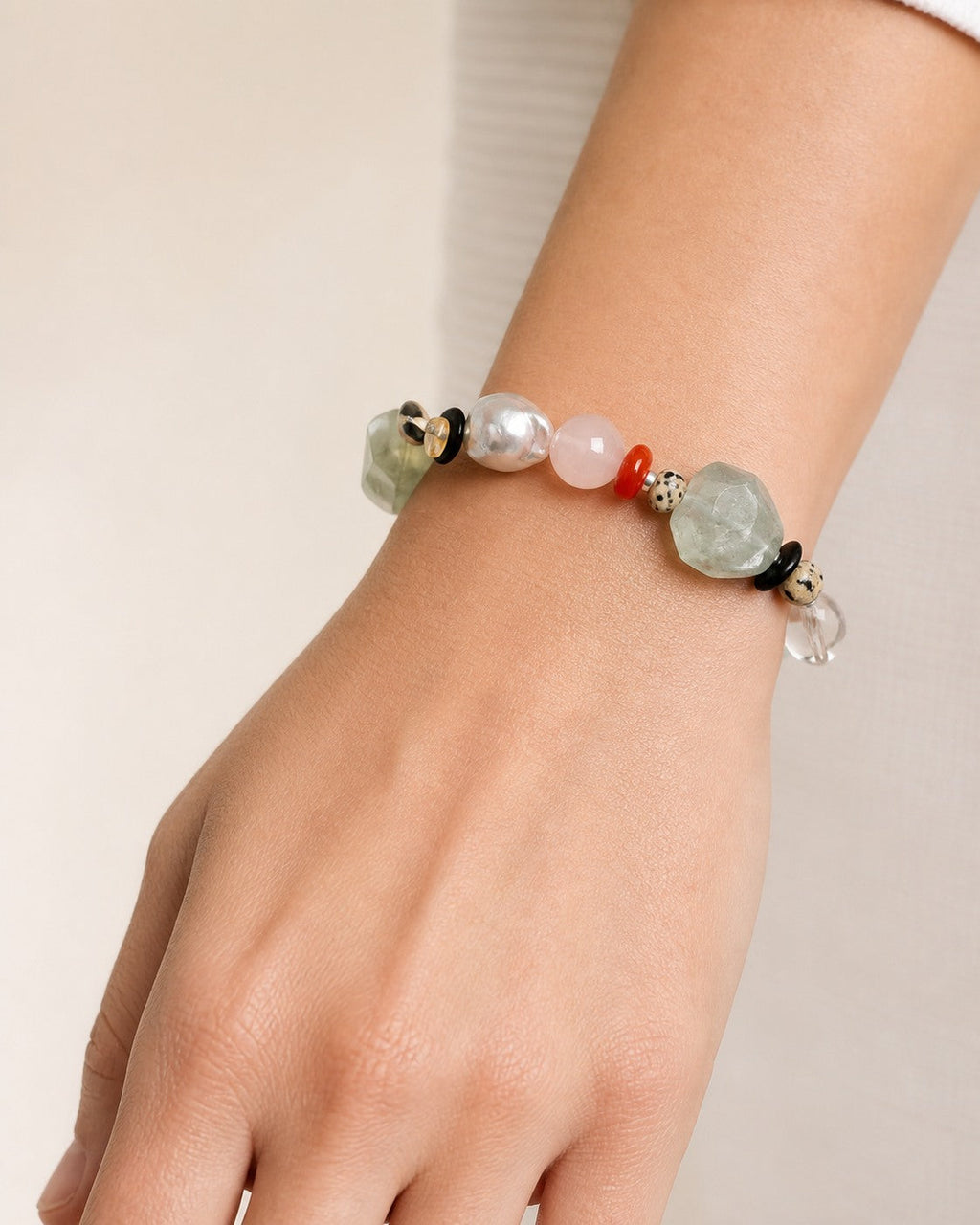 Citrine, clear quartz and mixed-stone bracelet worn securely around the wrist