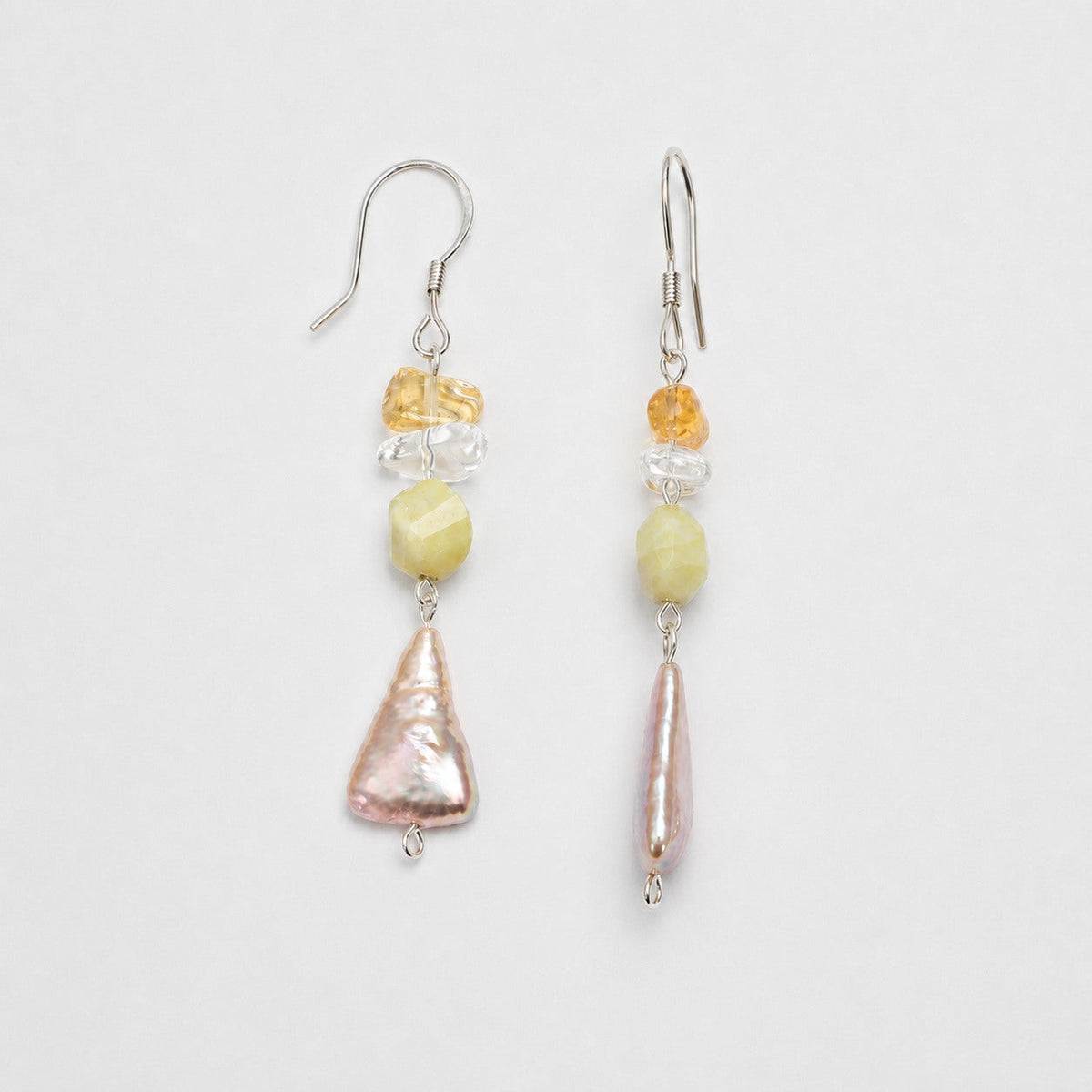 Citrine, clear quartz and freshwater pearl earring pair shown from front and side angles