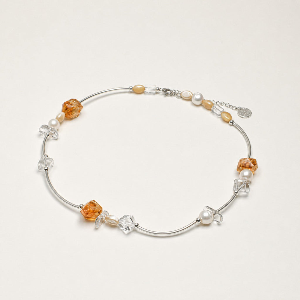 Citrine, clear quartz and pearl necklace shown from an alternate angle with its structure visible