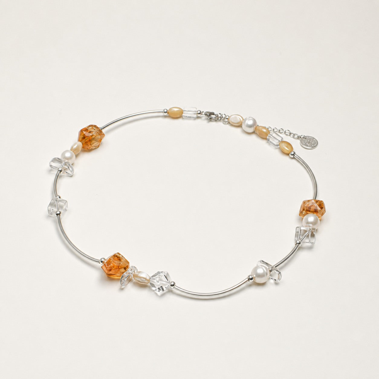 Citrine, clear quartz and pearl necklace shown from an alternate angle with its structure visible