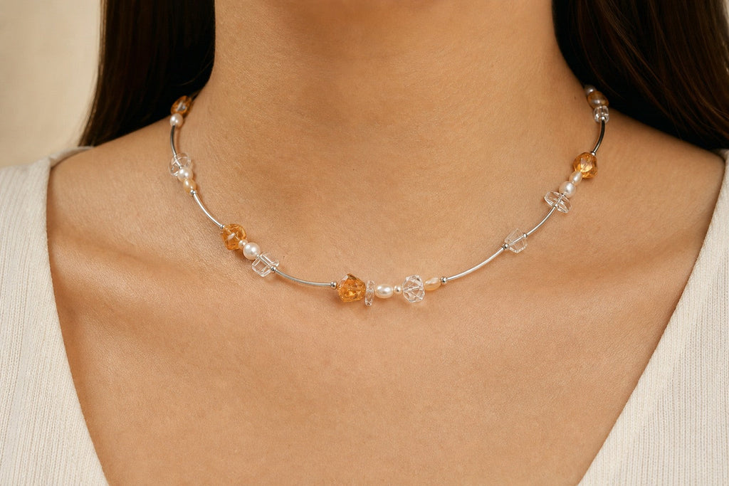 Citrine, clear quartz and pearl necklace worn around the neck at realistic 46 cm scale