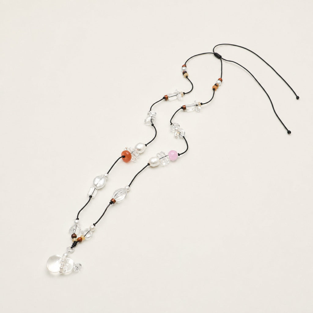 Long citrine, clear quartz and rose quartz necklace shown from an alternate angle