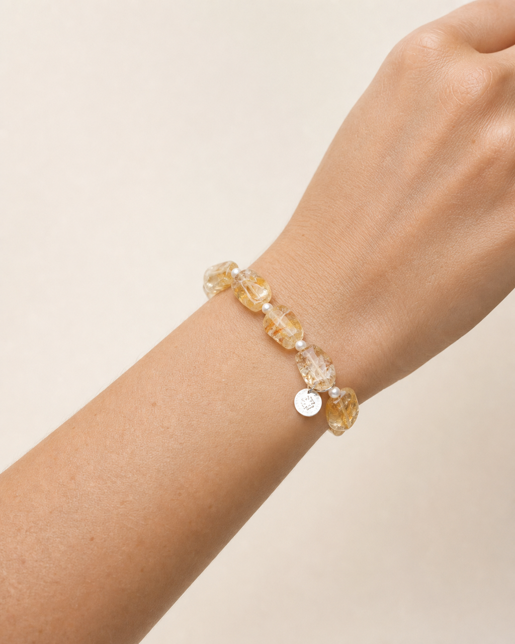 Citrine & Freshwater Pearl Bracelet worn correctly on wrist at realistic scale