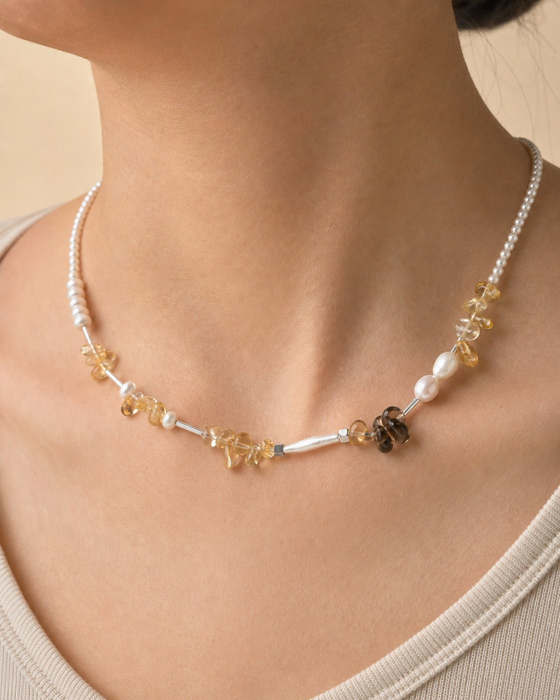 Citrine and freshwater pearl necklace worn around the neck at realistic 46 cm scale