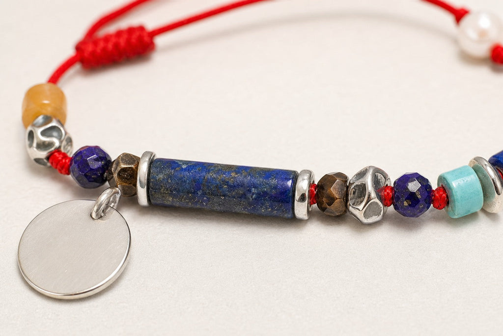 Close-up of lapis lazuli, citrine, turquoise and sterling silver bracelet workmanship