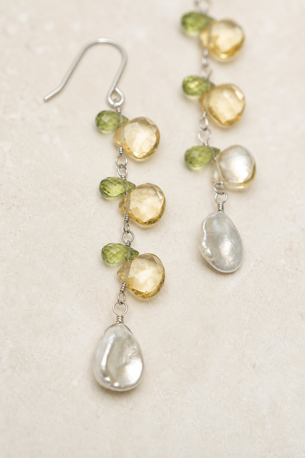 Close-up detail of Golden Tassel Citrine & Peridot Drop Earrings