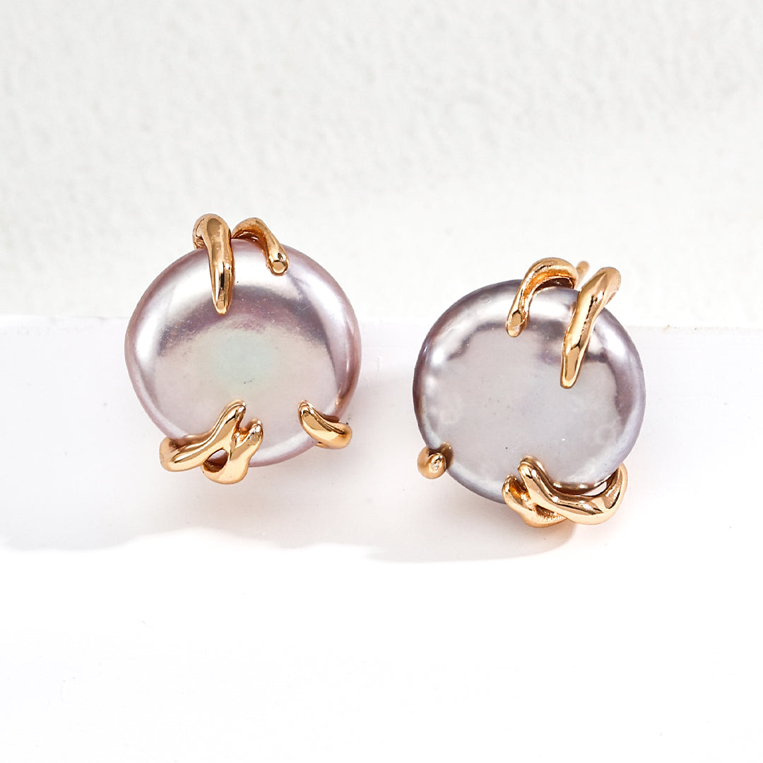 Grey Pearl Sculptural Stud Earrings — product and styling view; other jewellery sold separately