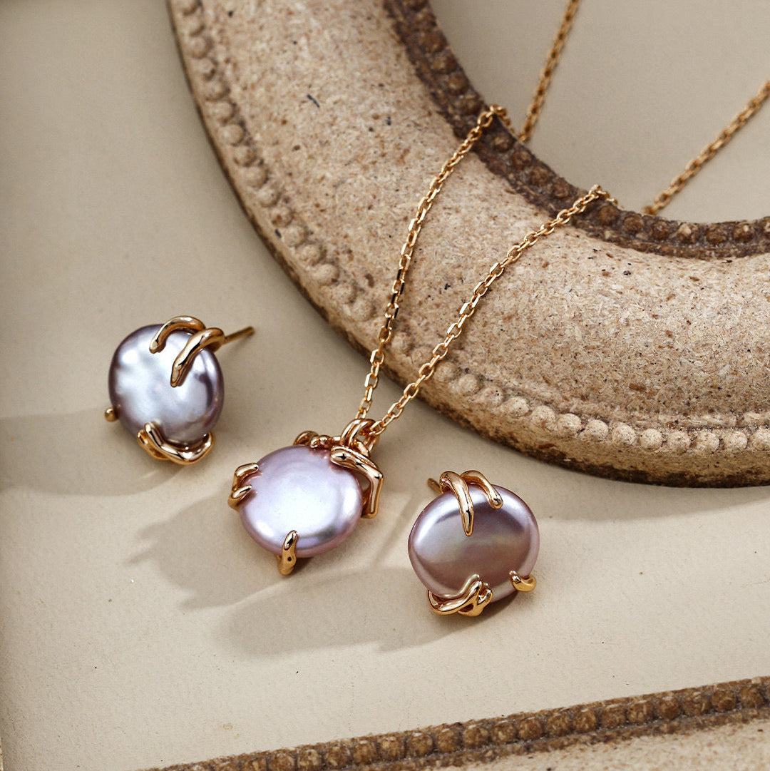 Grey Pearl Sculptural Stud Earrings — product and styling view; other jewellery sold separately