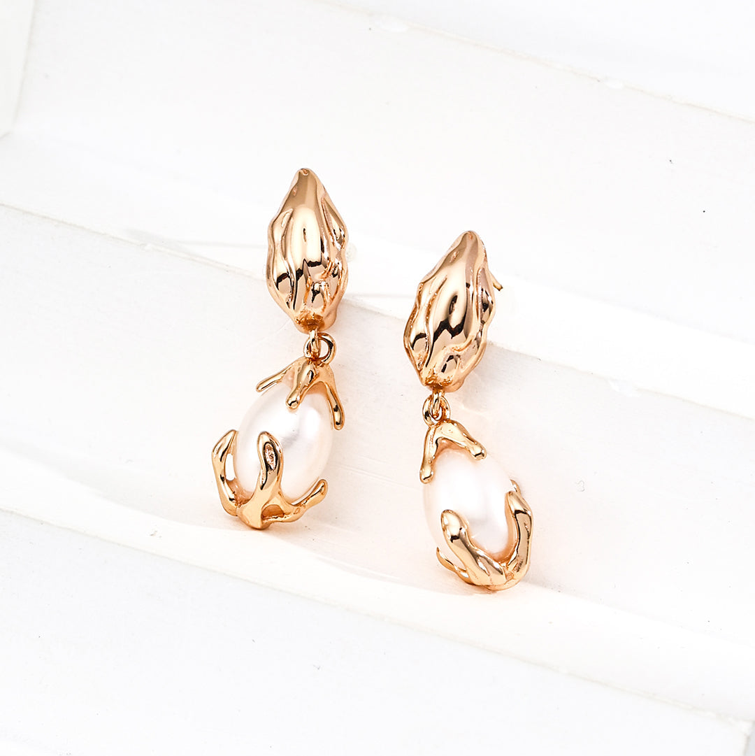 Molten Silver Pearl Drop Earrings — product and styling view; other jewellery sold separately