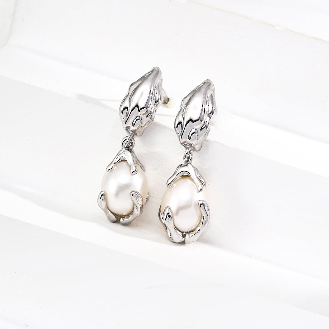 Molten Silver Pearl Drop Earrings — product and styling view; other jewellery sold separately