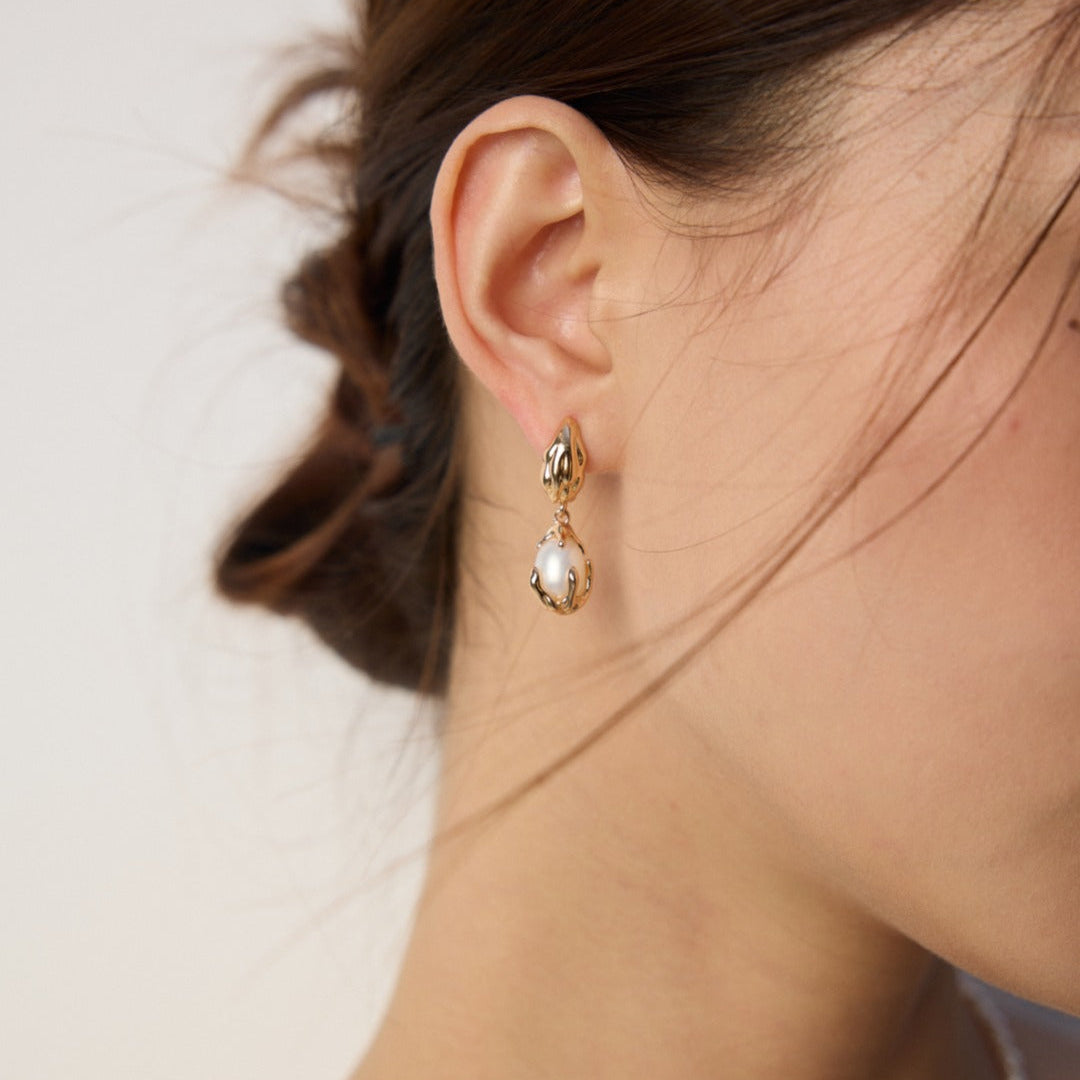 Molten Silver Pearl Drop Earrings — product and styling view; other jewellery sold separately
