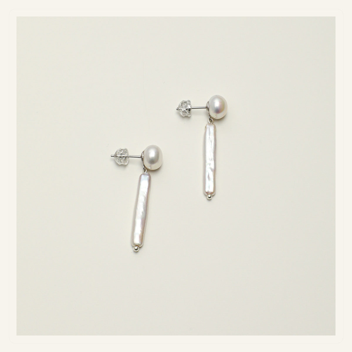 Moon White Pearl Drop Earrings product view on a clean neutral background
