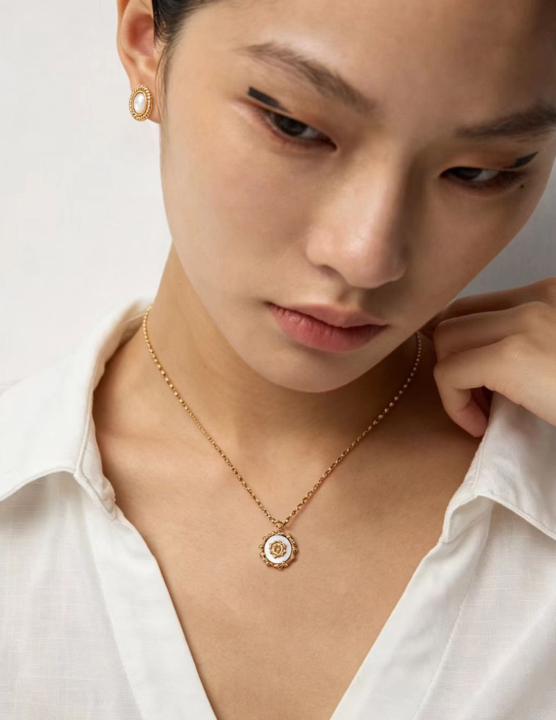 Mother-of-Pearl Sun Medallion Necklace — detail or styling view; other jewelry sold separately