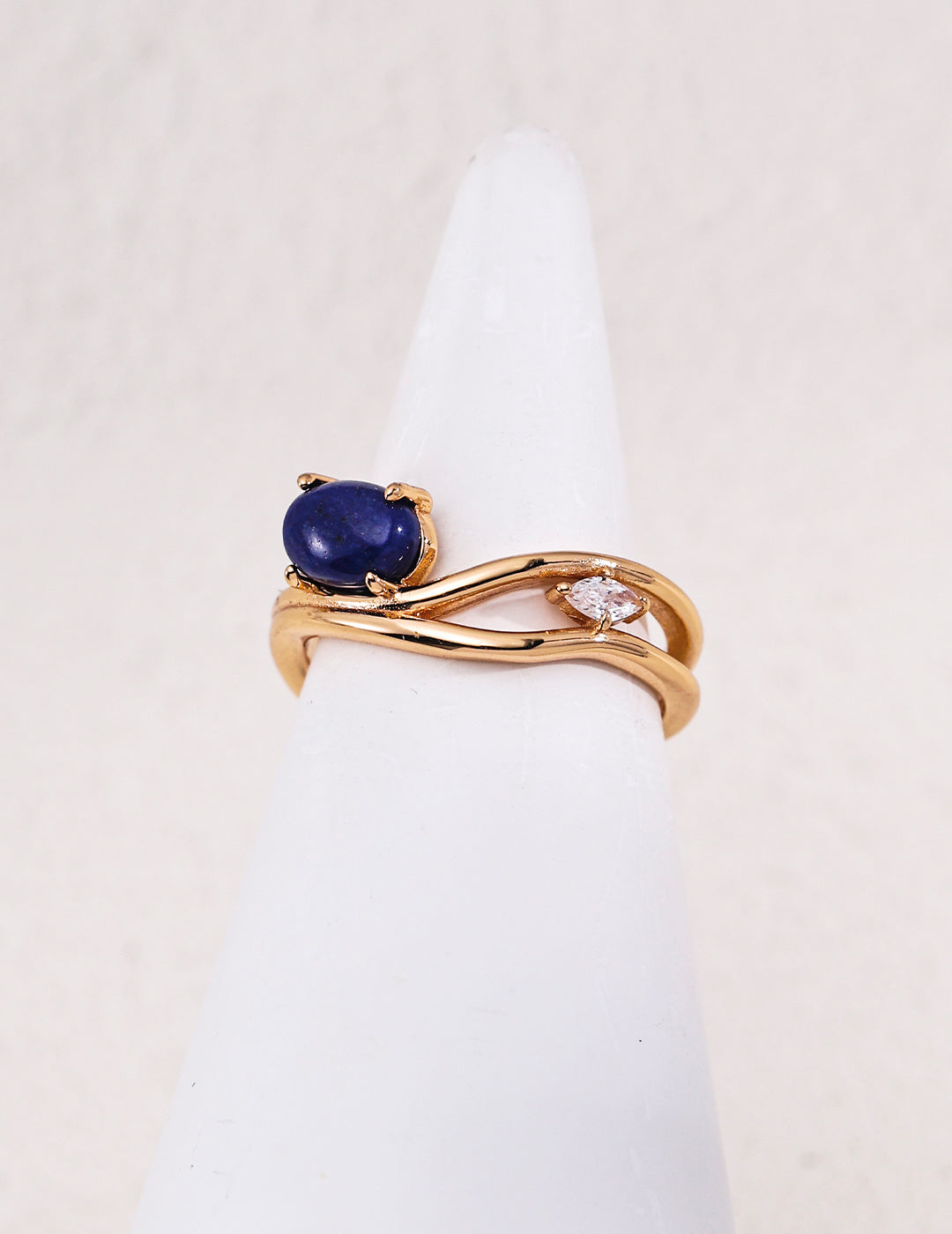 Lapis lazuli oval crossover ring in vintage gold-tone sterling silver