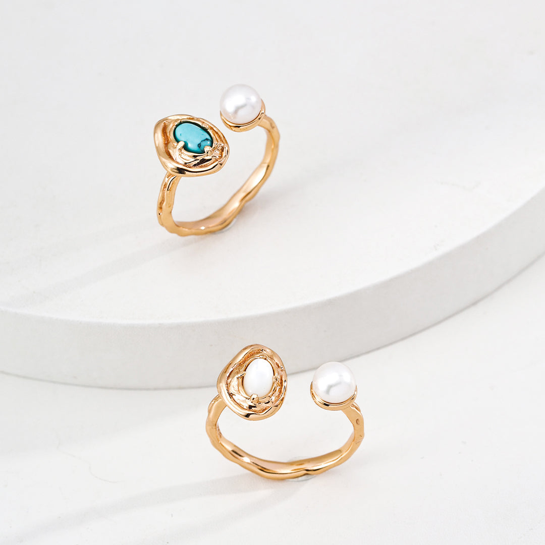 Turquoise and mother-of-pearl versions of the pearl open ring
