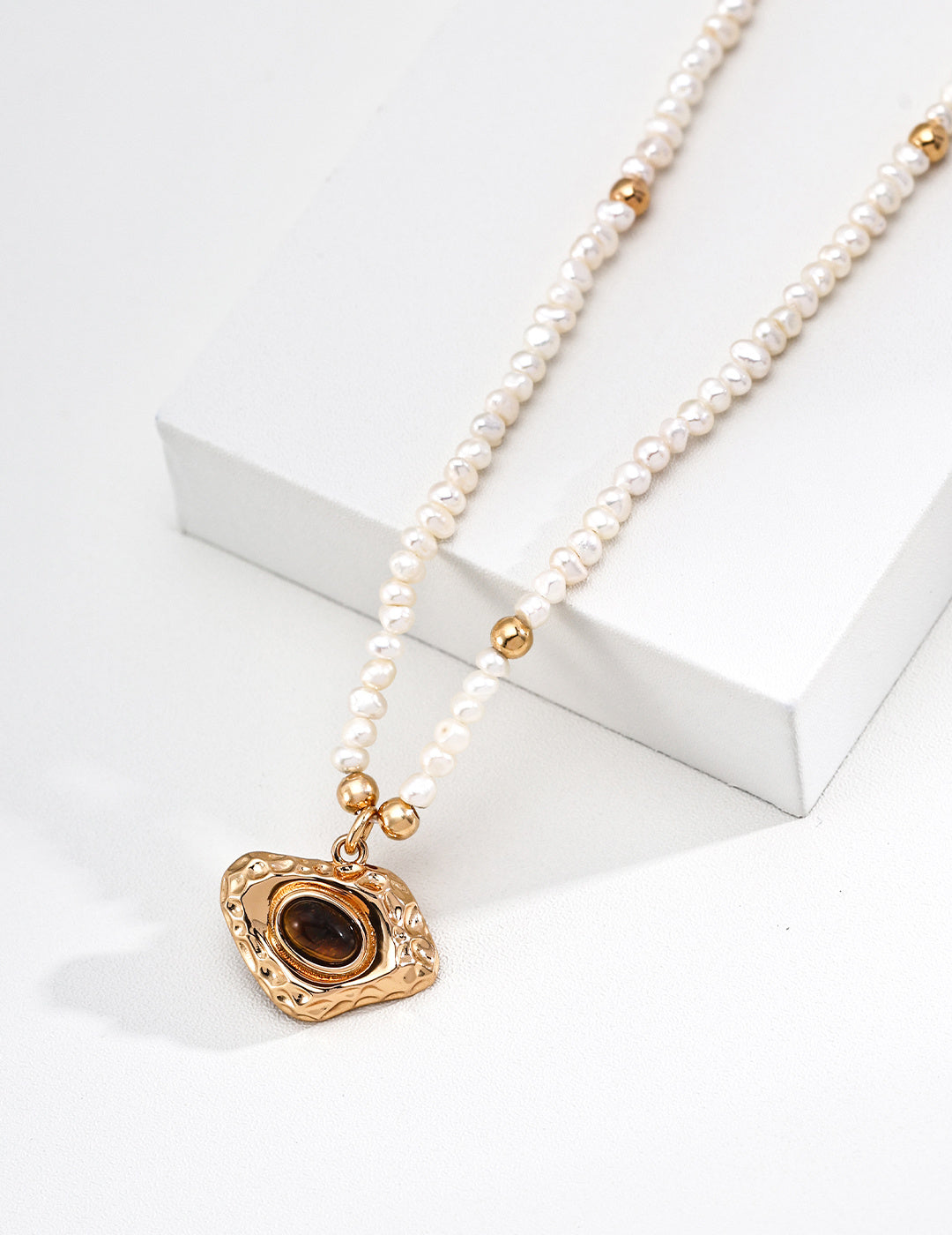 Pearl & Tiger's Eye Sculptural Pendant Necklace — detail or styling view; other jewelry sold separately