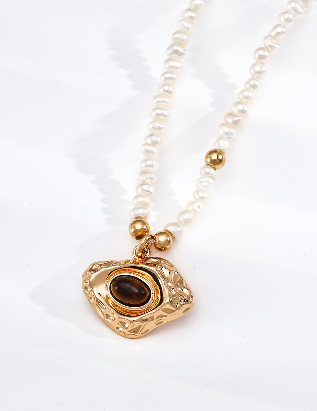 Pearl & Tiger's Eye Sculptural Pendant Necklace — detail or styling view; other jewelry sold separately