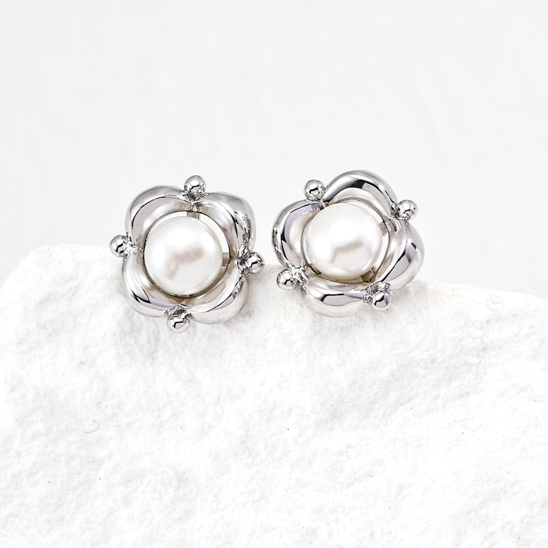 Petite Pearl Flower Stud Earrings — product and styling view; other jewellery sold separately