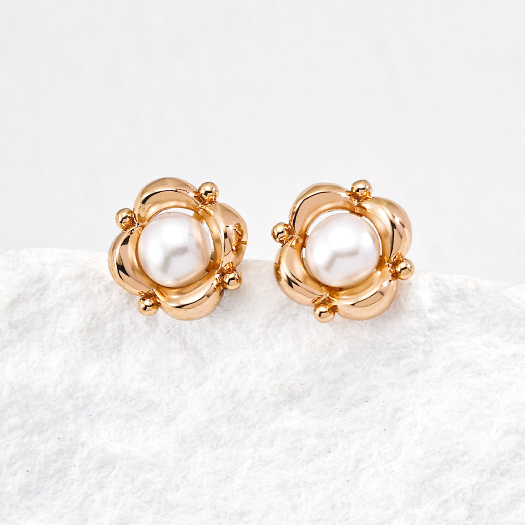 Petite Pearl Flower Stud Earrings — product and styling view; other jewellery sold separately