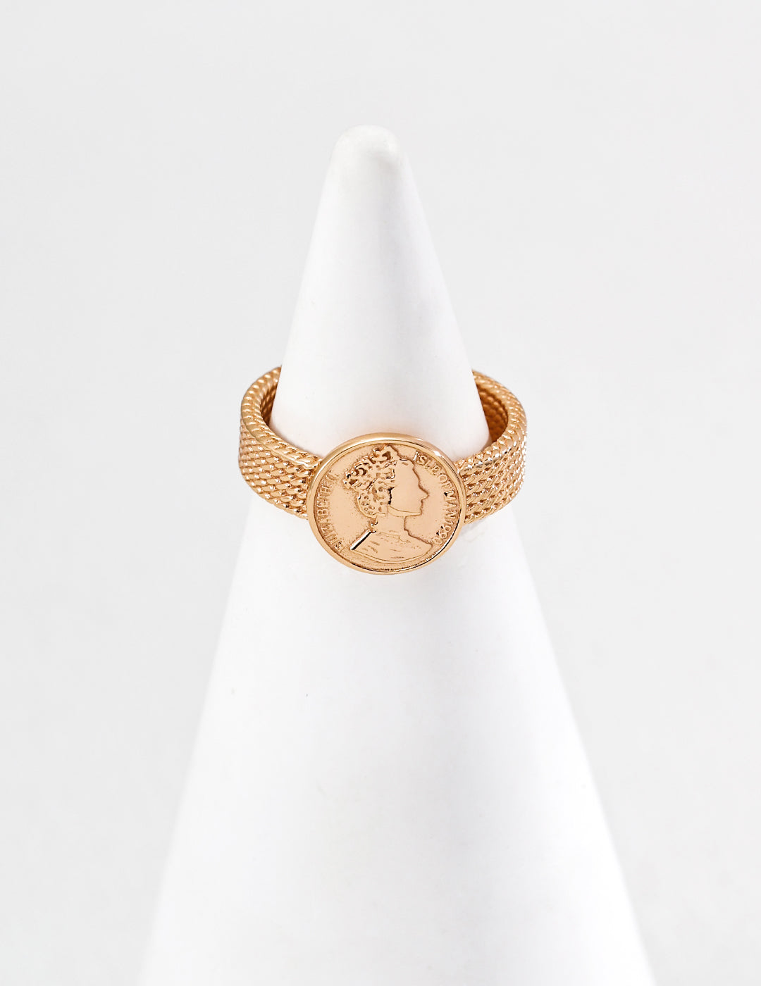 Portrait medallion open ring on a display stand