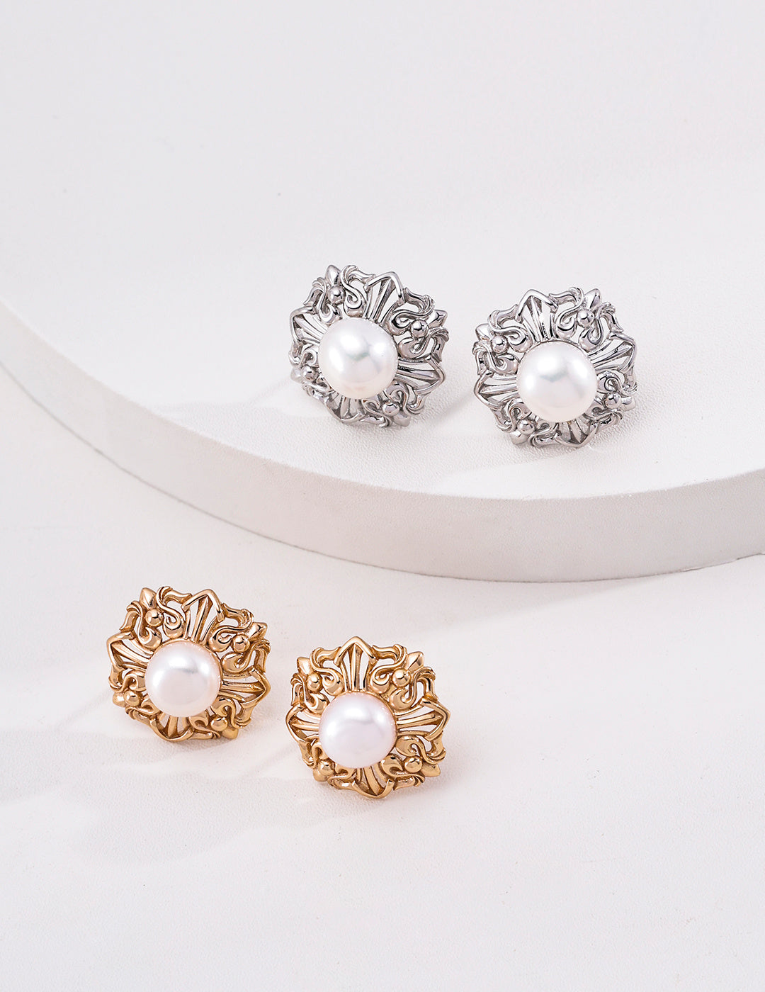 Coordinating floral medallion earrings shown separately from the necklace
