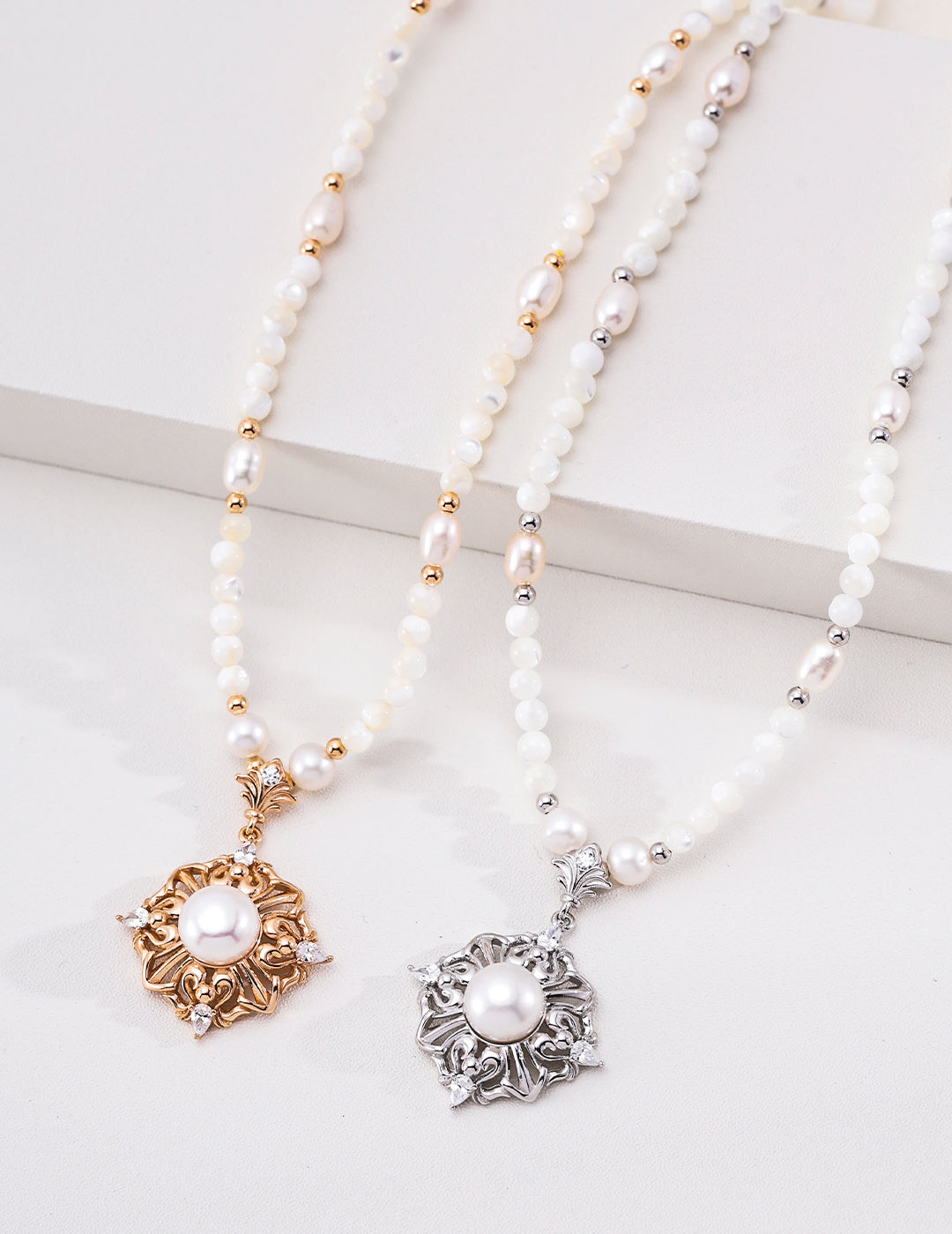 Pearl floral medallion necklaces in silver and vintage gold tones