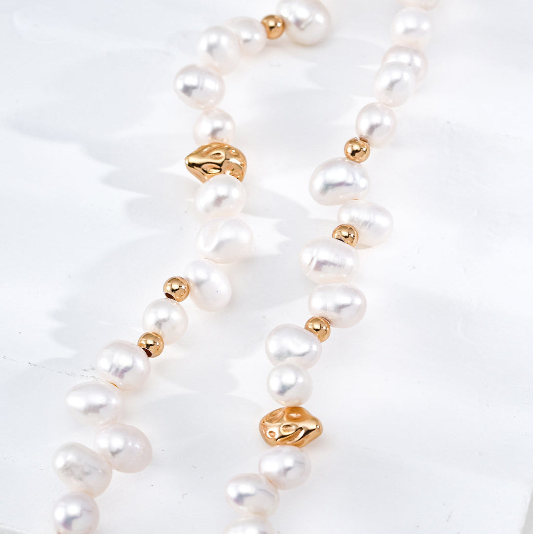 Detail of pearls and gold-tone sterling silver beads