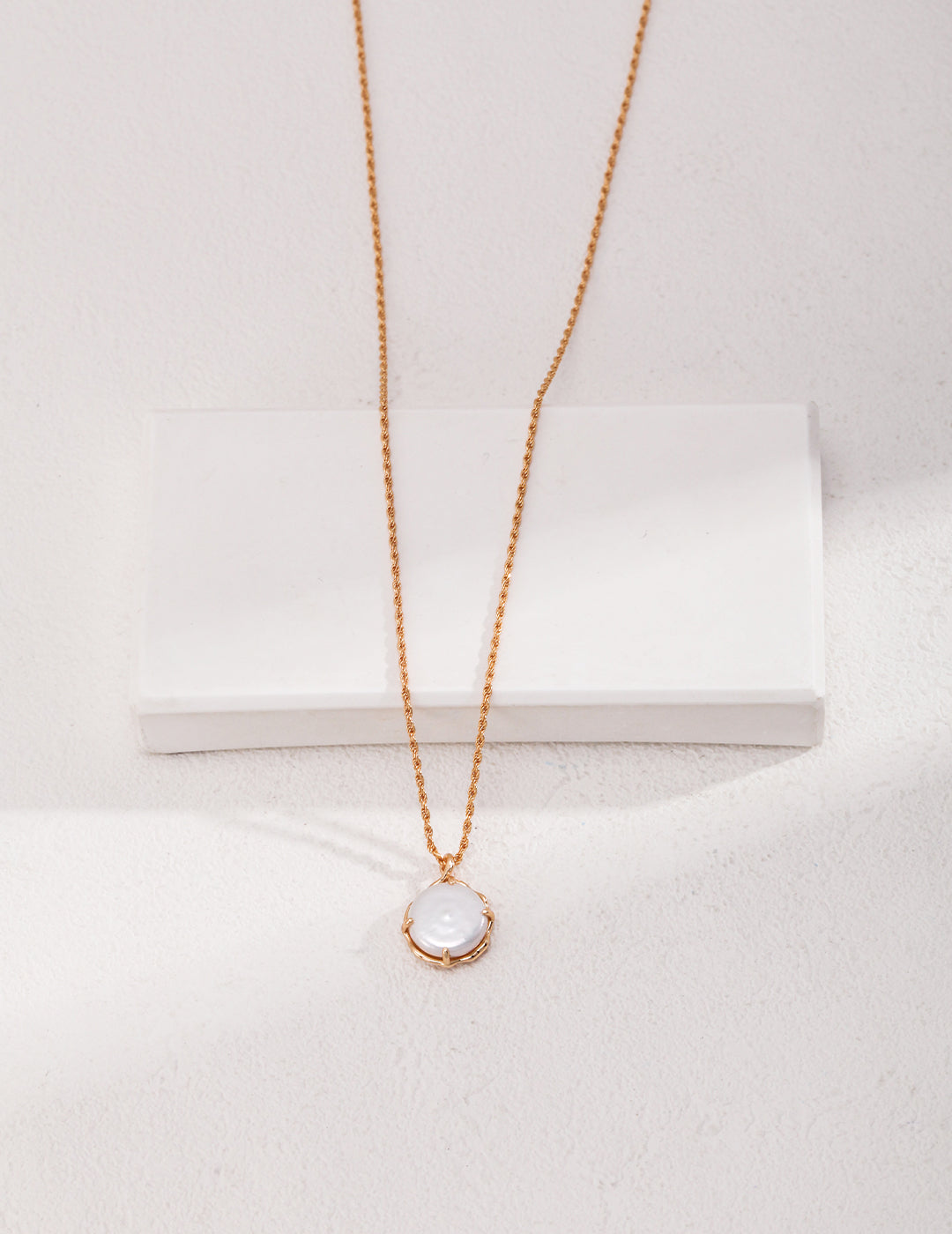 Textured Round Pearl Pendant Necklace — detail or styling view; other jewelry sold separately