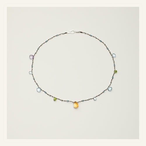 Violet Dew Blue Topaz Necklace product view on a clean neutral background
