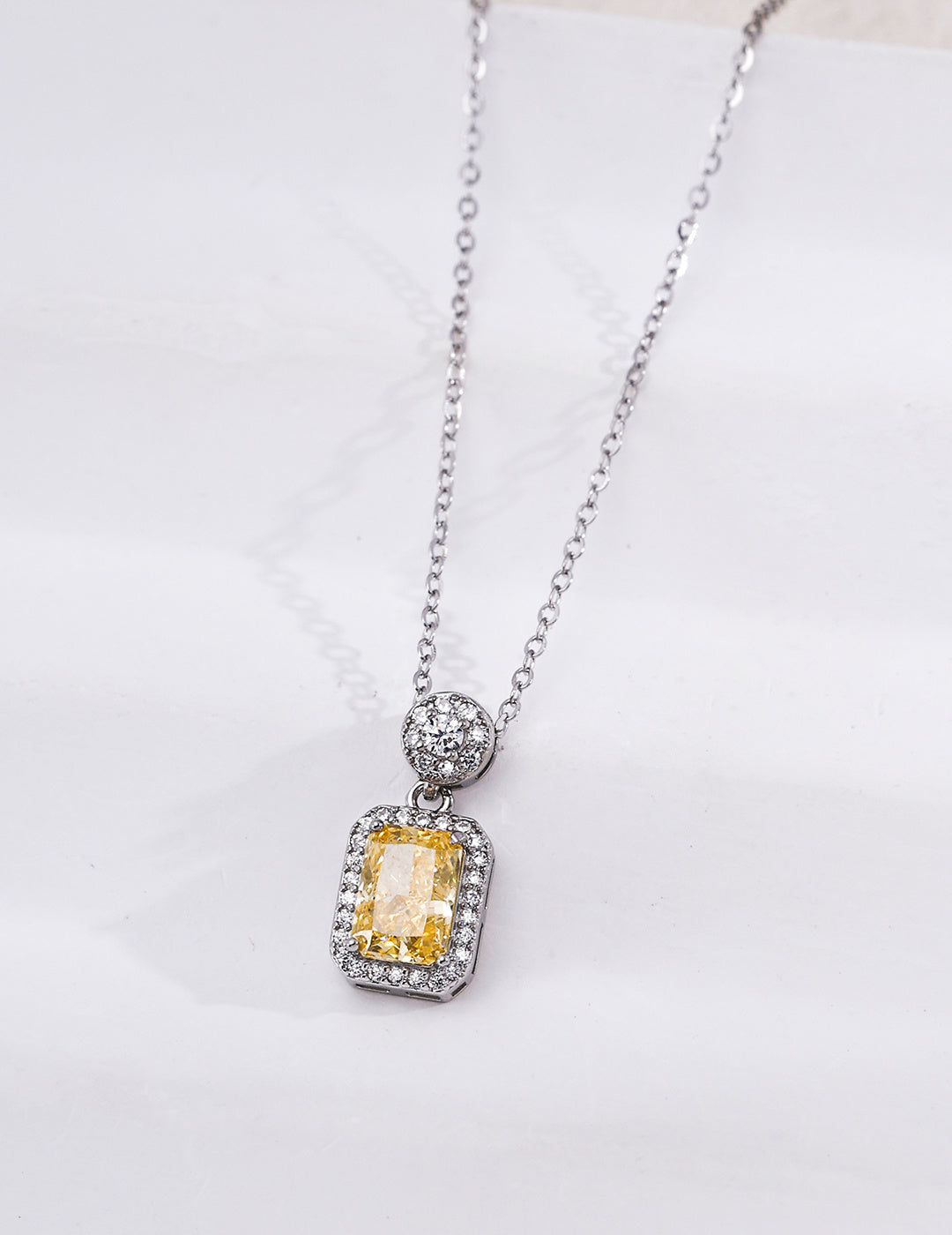 Yellow Cubic Zirconia Halo Pendant Necklace — detail or styling view; other jewelry sold separately